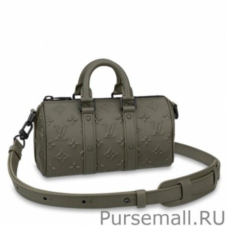 Replica Keepall XS Bag Monogram Seal Leather M57961